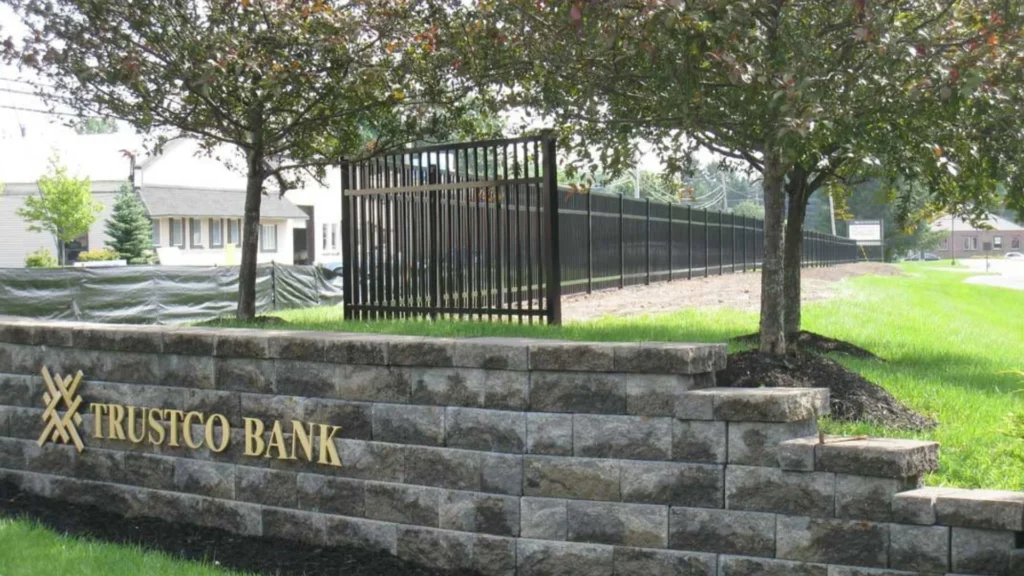 Black ornamental aluminum fence installed by Mariaville Fence