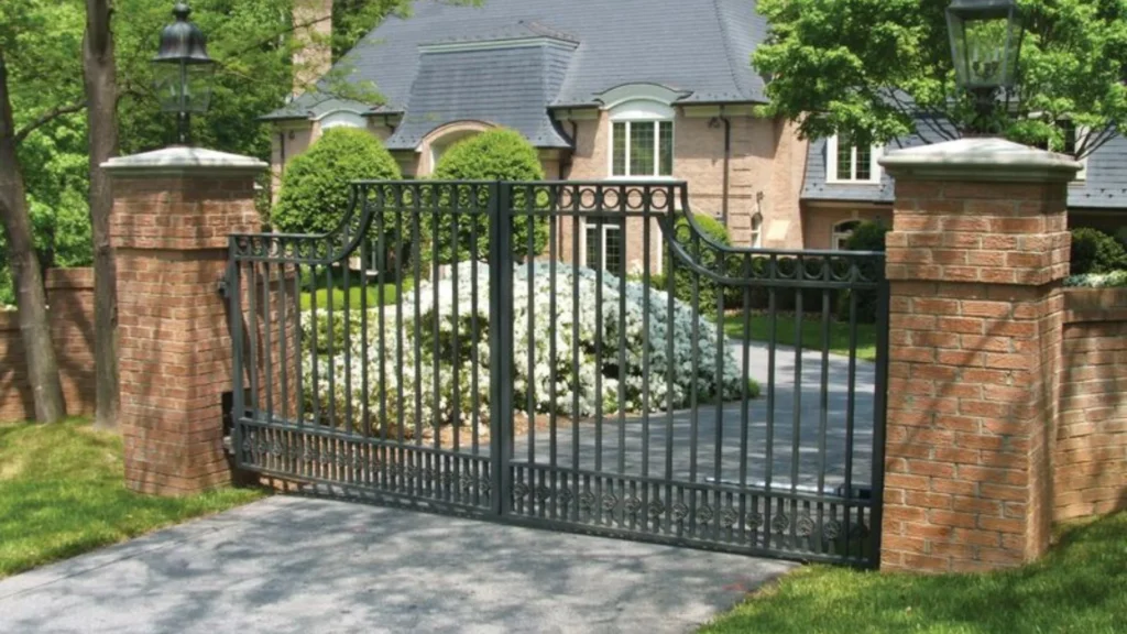 Black automatic driveway gate installed by Mariaville Fence