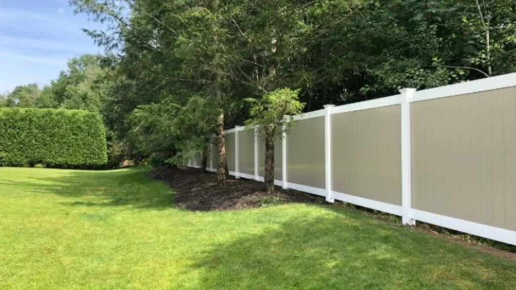 Residential vinyl privacy fence installed by Mariaville Fence
