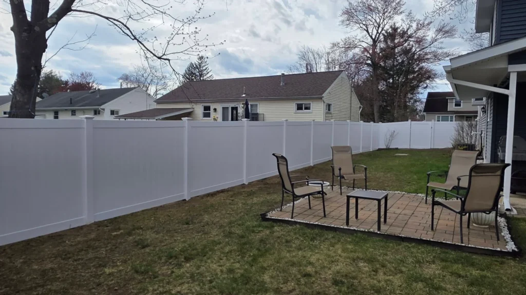 White vinyl fence installed by Mariaville Fence